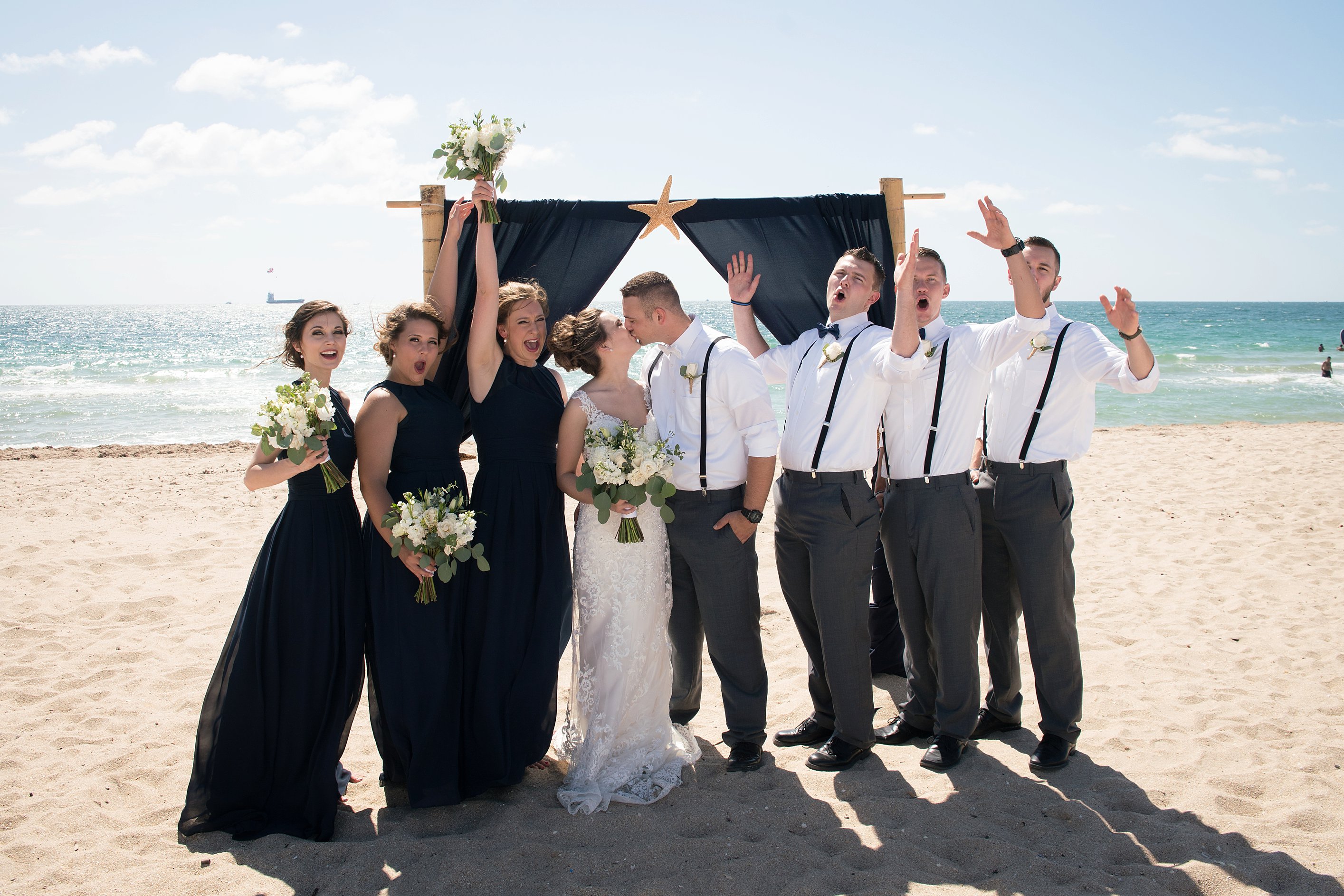 Beach wedding party photo