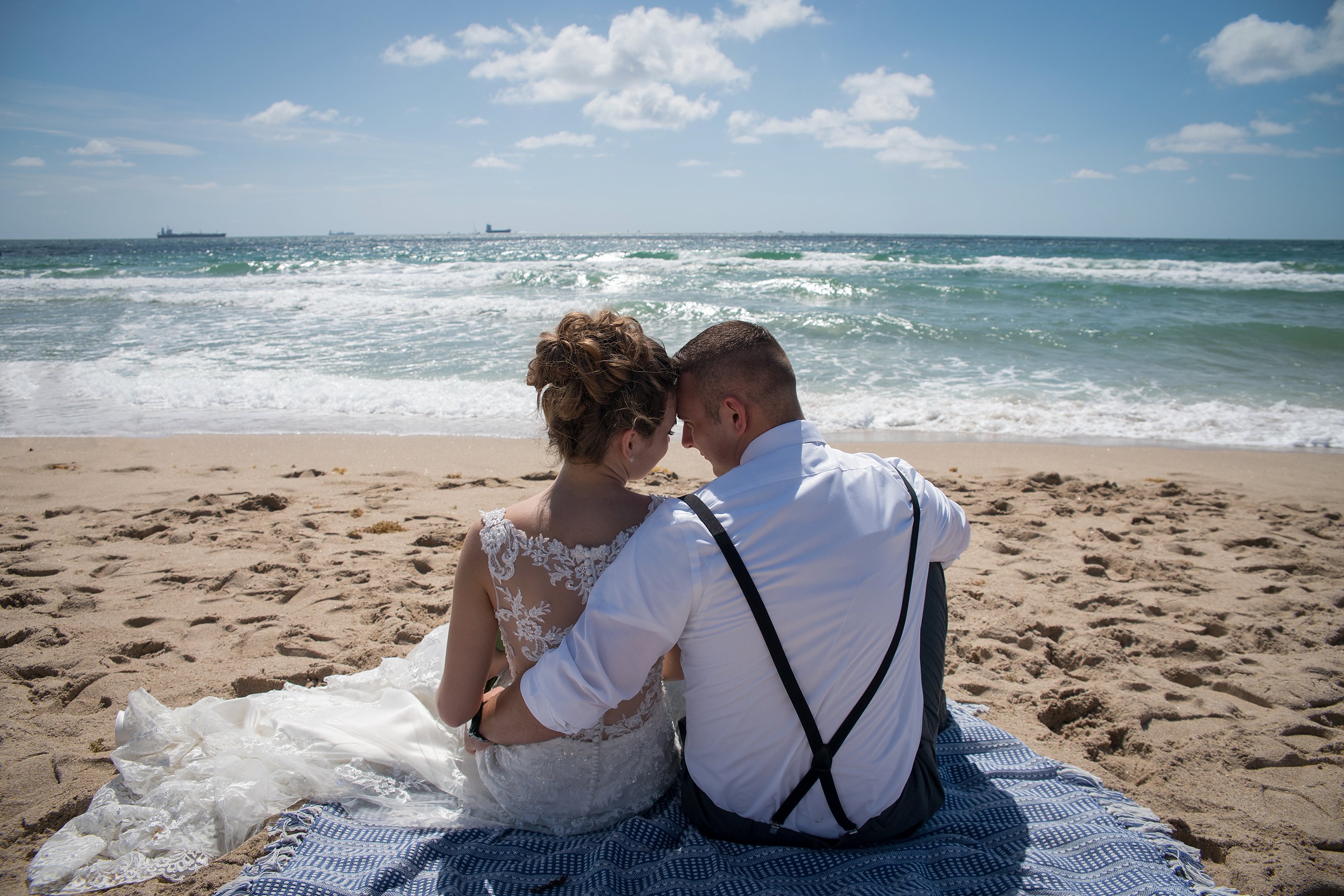 cuddling in the beach wedding photo