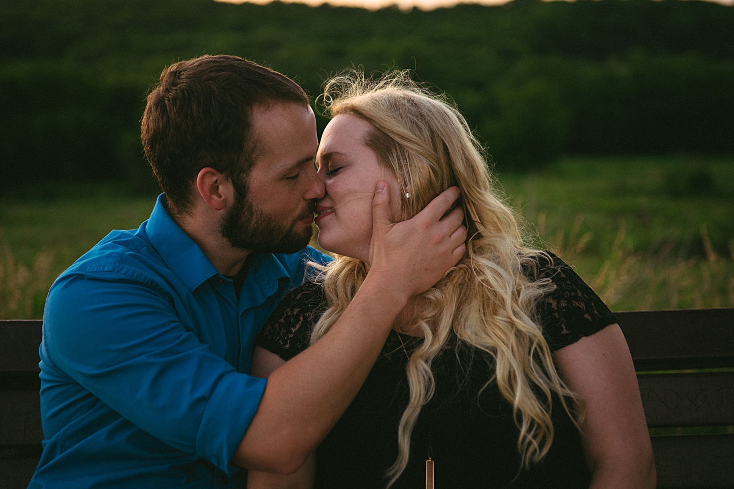 Moody kissing engagement photo Emily Lynn Photography