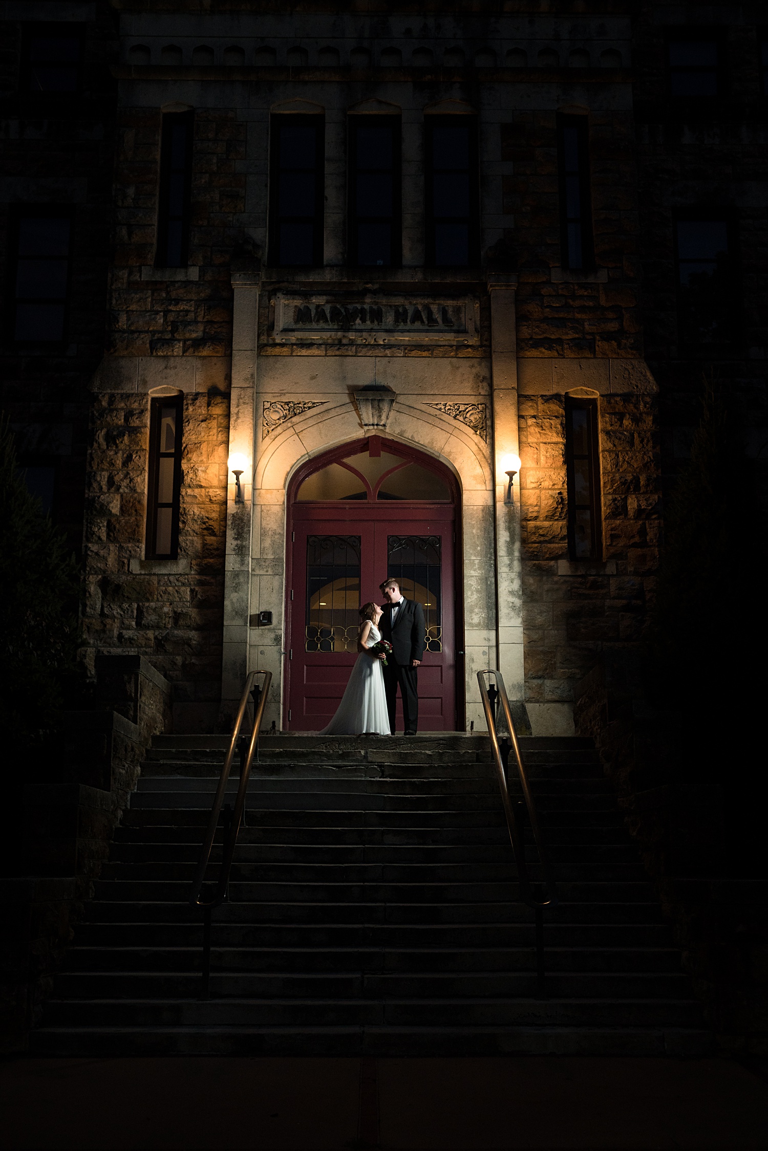 Wedding images of couple at Potter's Lake in Lawrence, KS at KU's campus