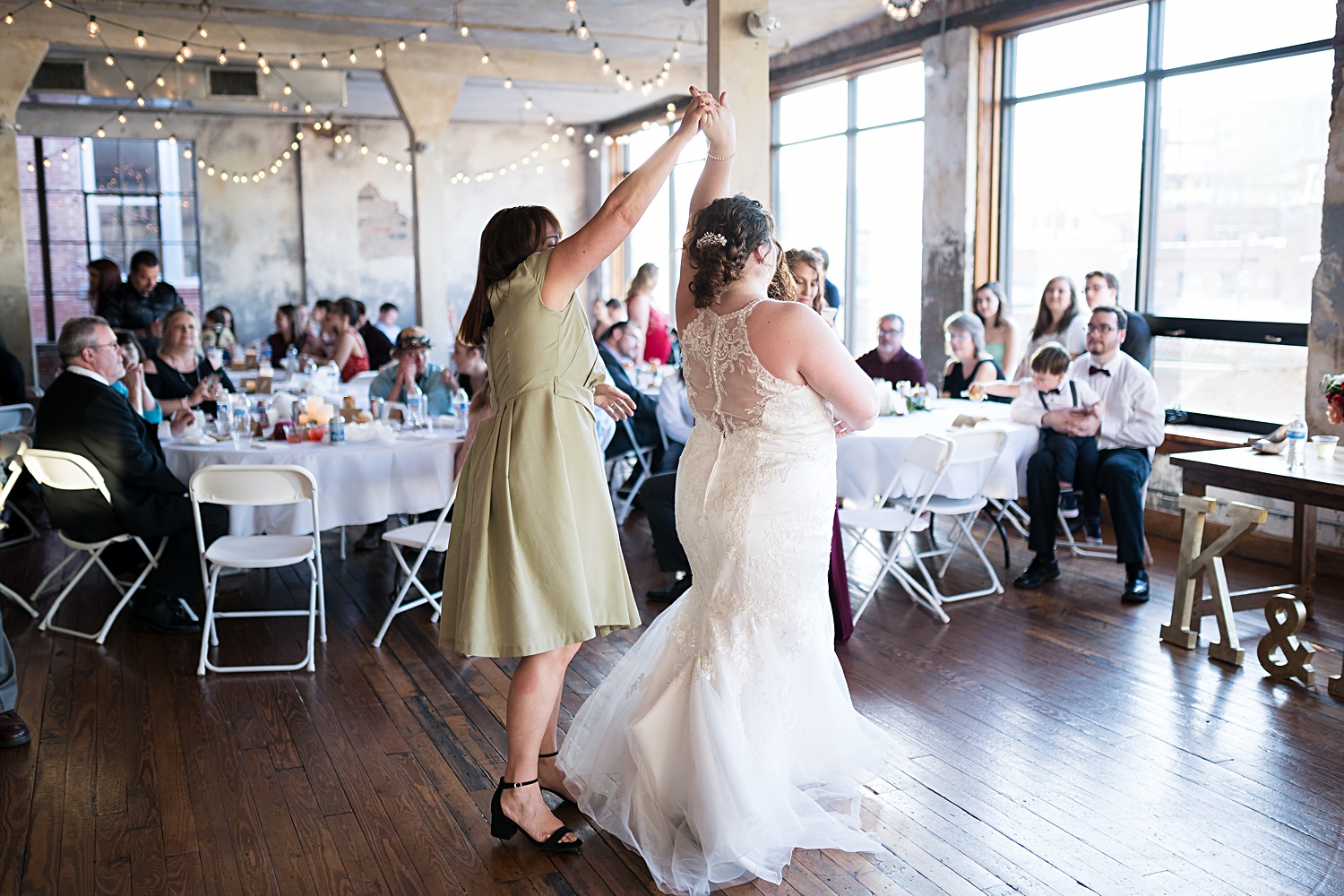 First-Dance-Wedding-Reception-Photos-The-Bride-and-Bauer-Kansas-City-Wedding-Photographer-Emily-Lynn-Photography