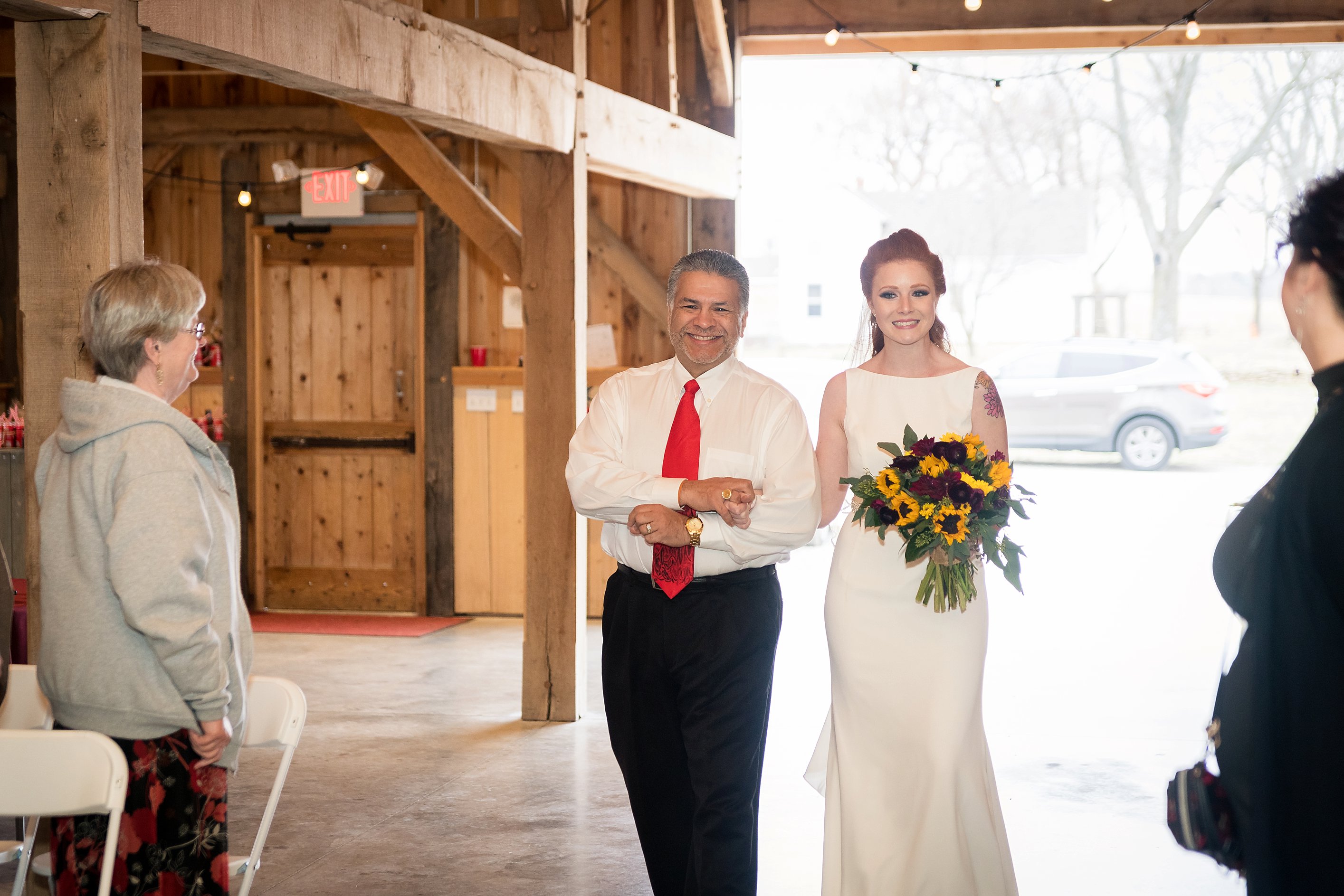 Dad walk bride down the isle. Wedding-Ceremony-Photos-The-Barn-at-Kill-Creek-Wedding-Photos-De-Soto-KS-Emily-Lynn-Photography
