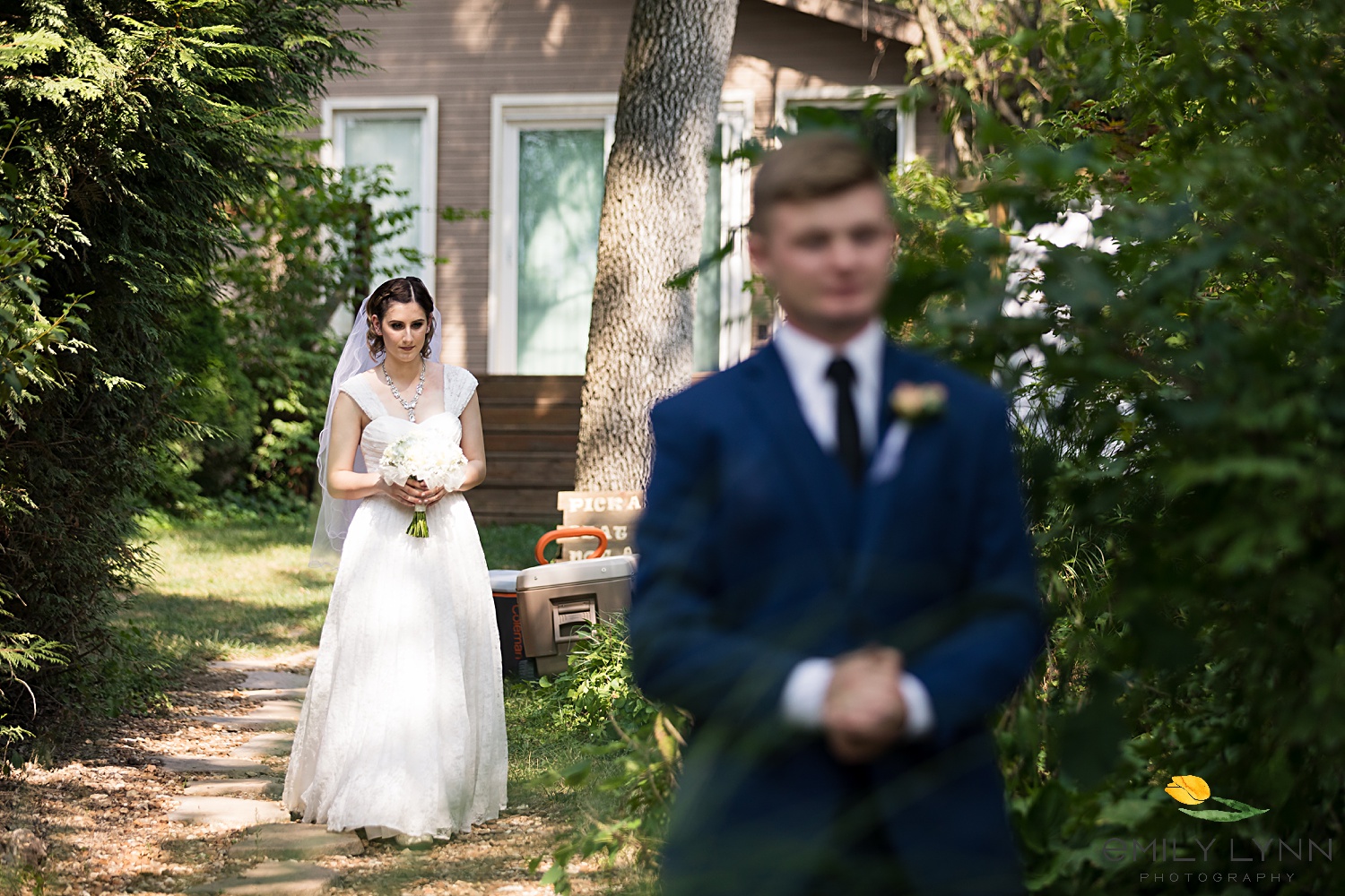 First look photo. Wedding-Photos-at-Enchanted-Acres-KC-Wedding-Photographer-Emily-Lynn-Photography.