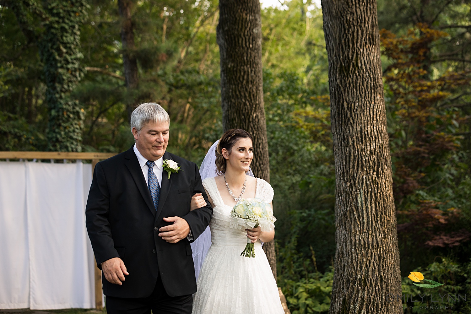 Ceremony photo. Wedding-Photos-at-Enchanted-Acres-KC-Wedding-Photographer-Emily-Lynn-Photography.