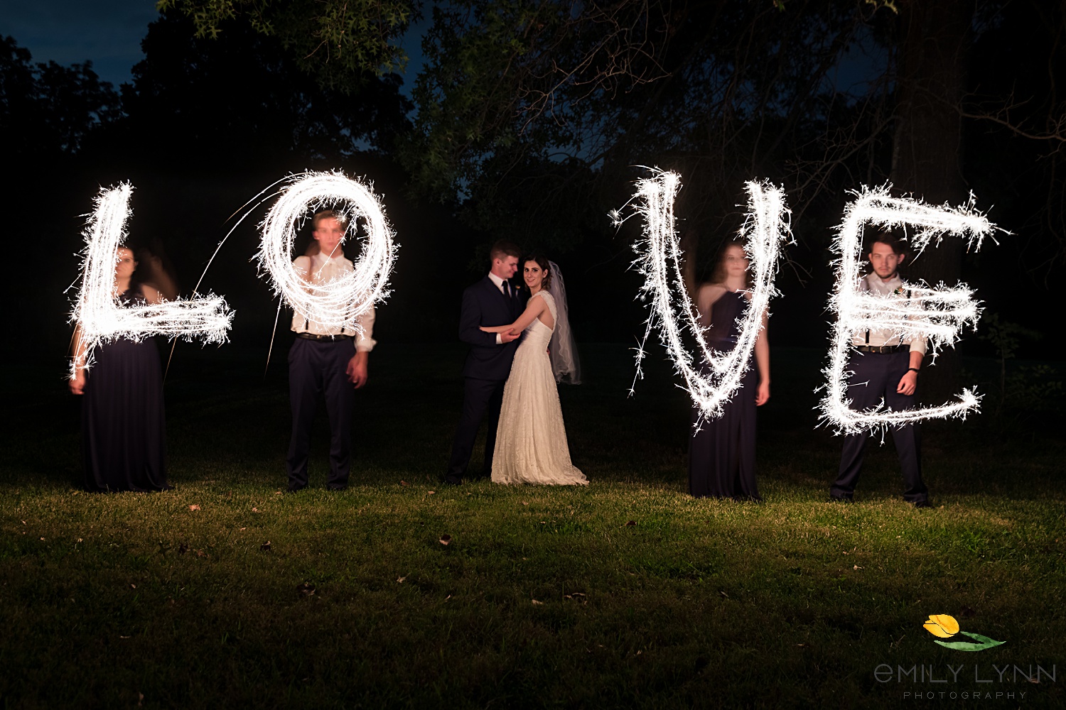 Posed fireworks LOVE photo. Wedding-Photos-at-Enchanted-Acres-KC-Wedding-Photographer-Emily-Lynn-Photography.