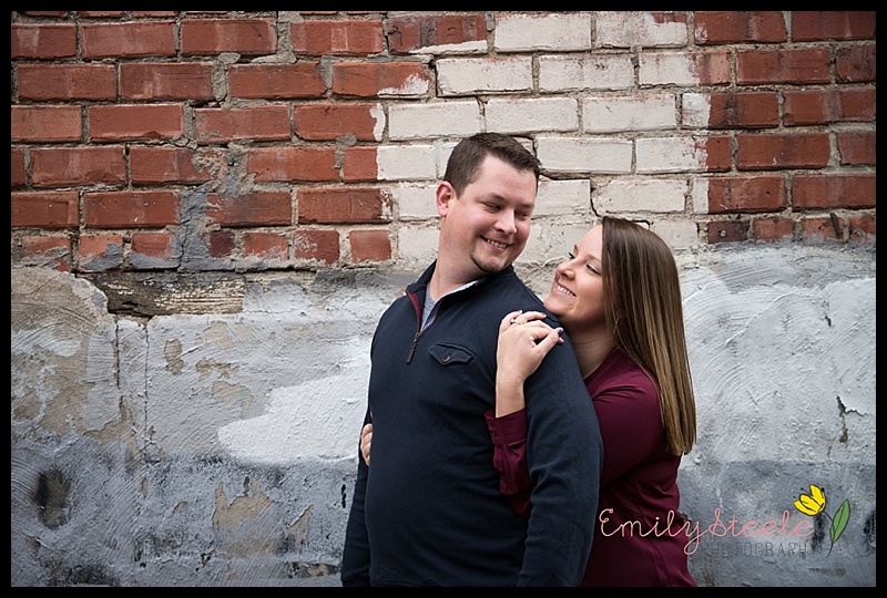 Downtown engagement photo in Lawrence, KS