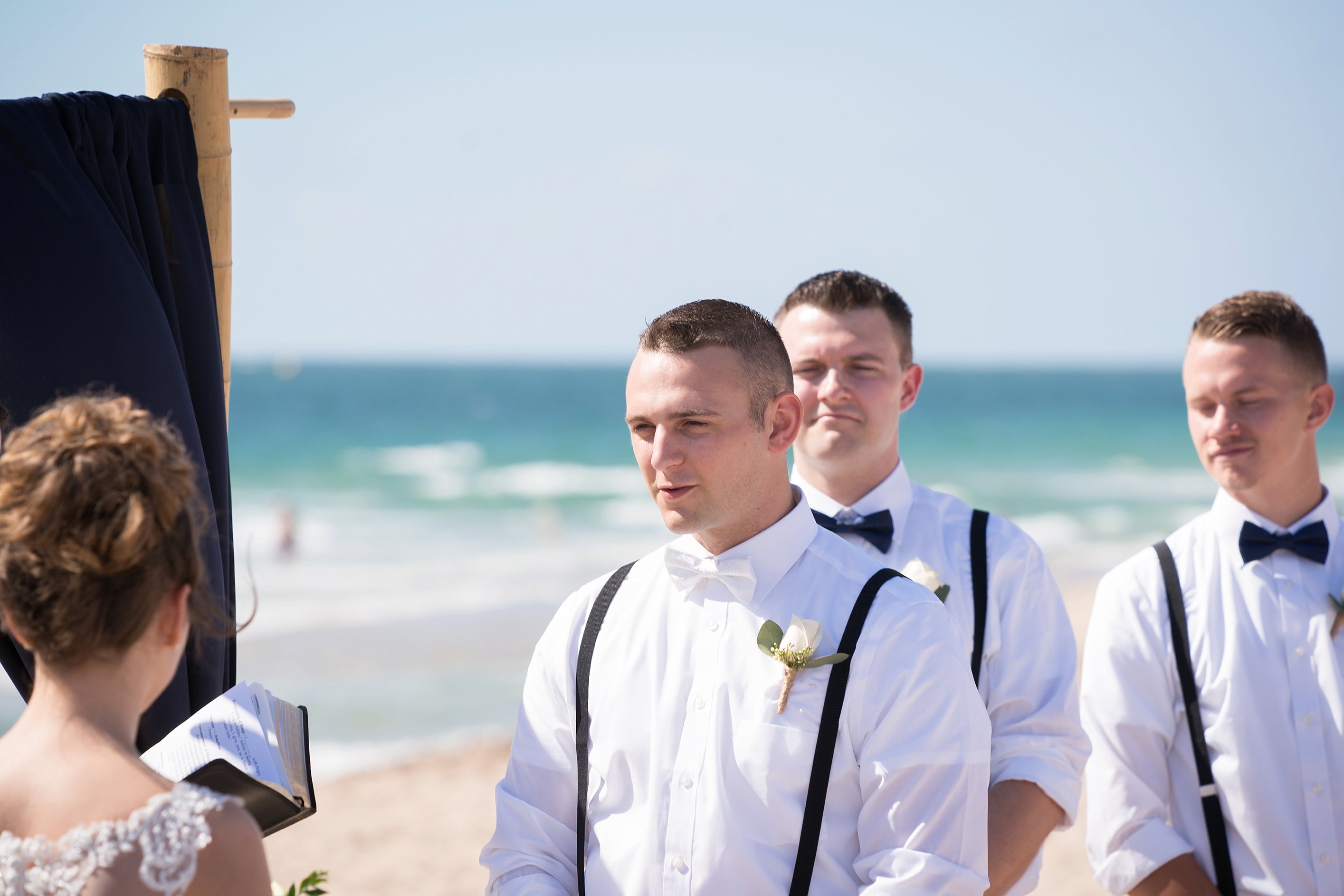 Navy blue beach wedding photo