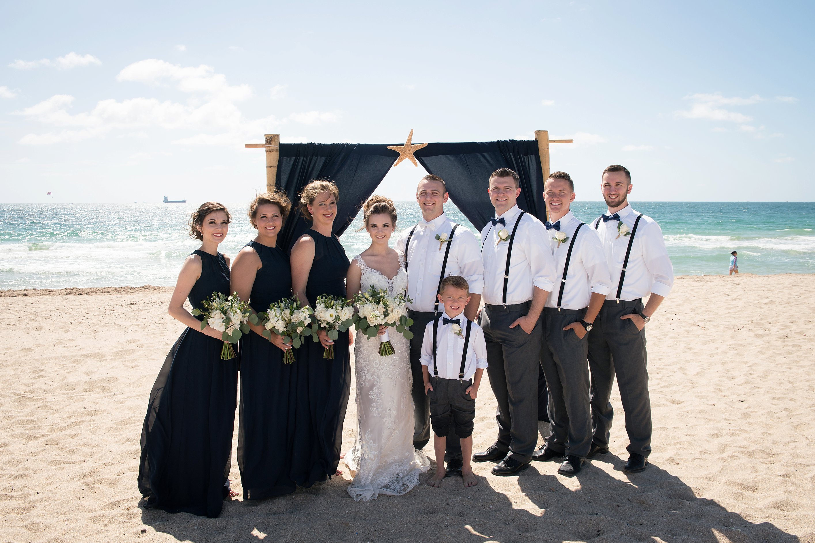 Beach wedding party photo