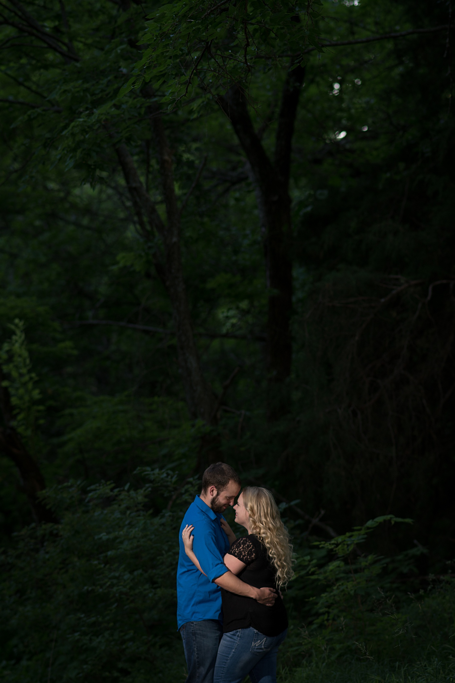 Engagement session at Clinton Lake in the trees