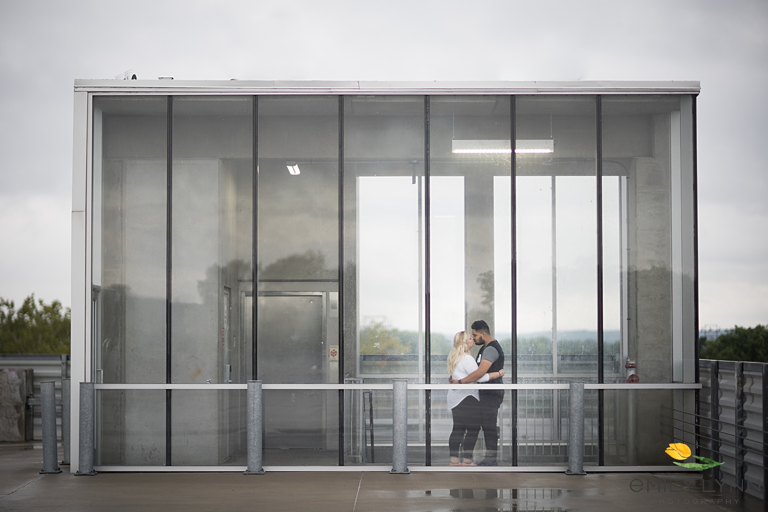 Rainy-day-engagement-photos-in-parking-garage-Lawrence, KS- Engagement-Photographer-Emily-Lynn-Photography