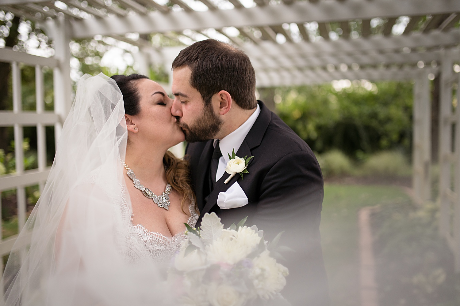 Couple's wedding photo with the veil. VVI Wedding - Victoria Veranda Country Inn Wedding Photos- Lawrence, KS-Wedding-Photographer-Emily-Lynn-Photography_